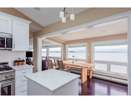 140 Fort Point Road Weymouth, MA 02191 - Photo 11 of 24 a kitchen with sink cabinets and wooden floor