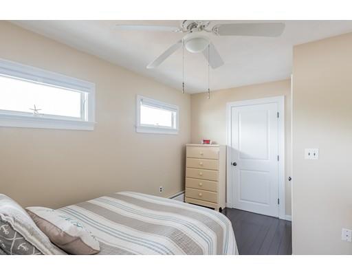 140 Fort Point Road Weymouth, MA 02191 - Photo 22 of 24 a bedroom with a bed and a window