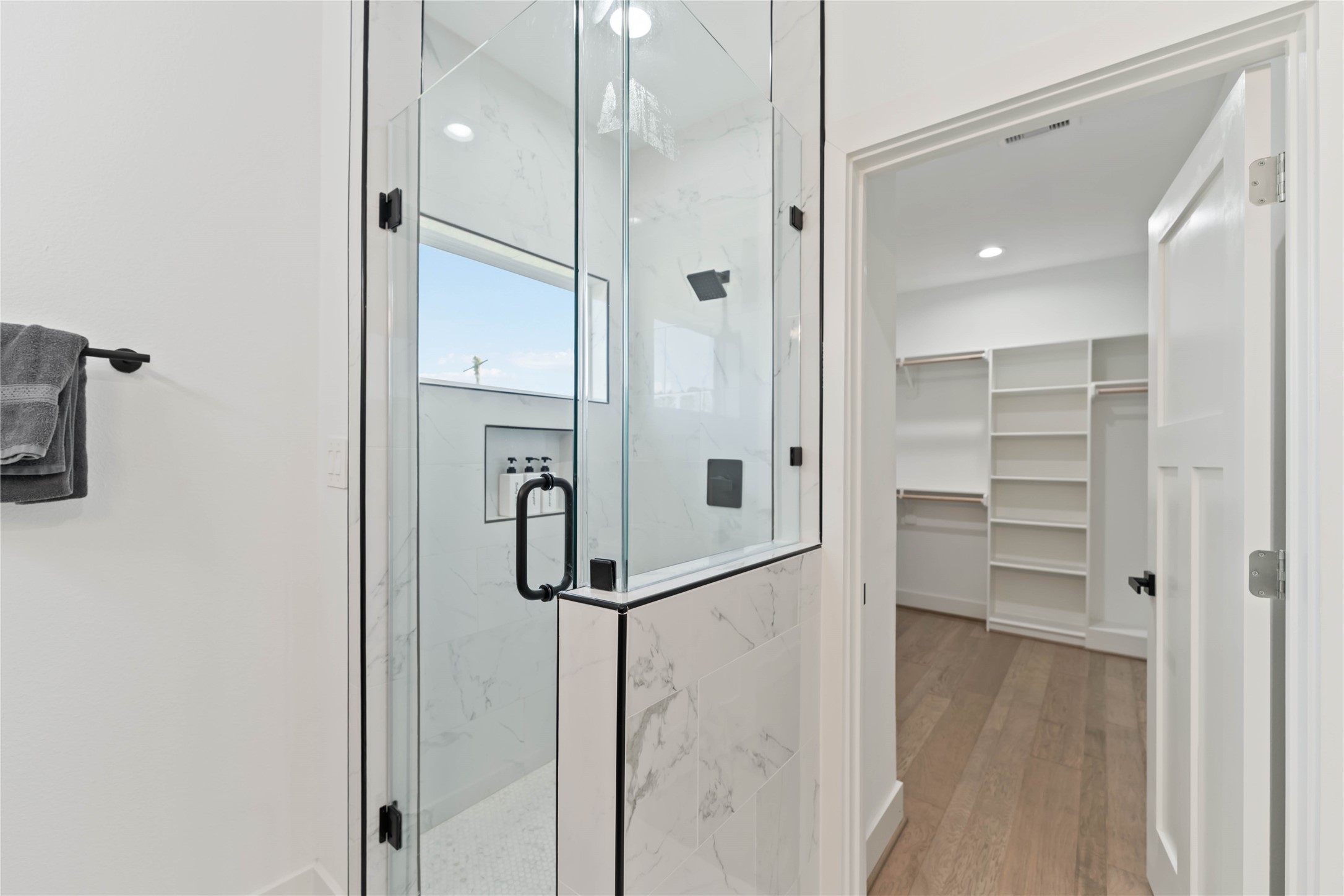 3034 Gray Street, Unit B Houston, TX 77004 - Photo 15 of 23 a bathroom with a shower and a glass door
