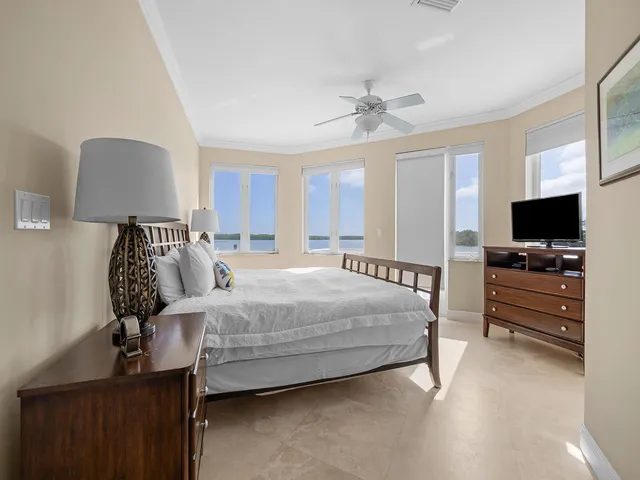 a bedroom with a bed and furniture