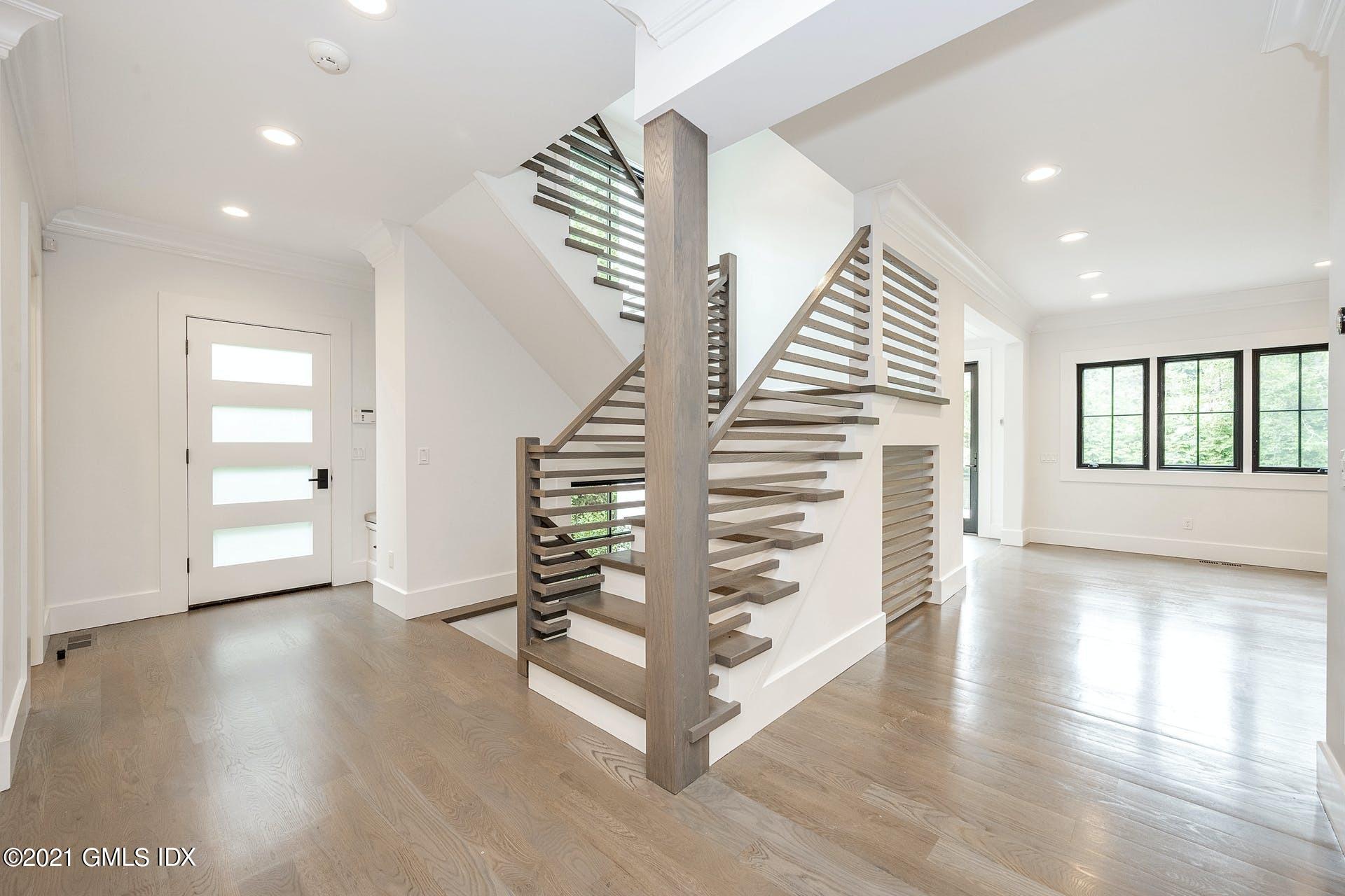 22 Wescott Street Riverside, CT 06878 - Photo 13 of 37 an empty room with wooden floor and windows
