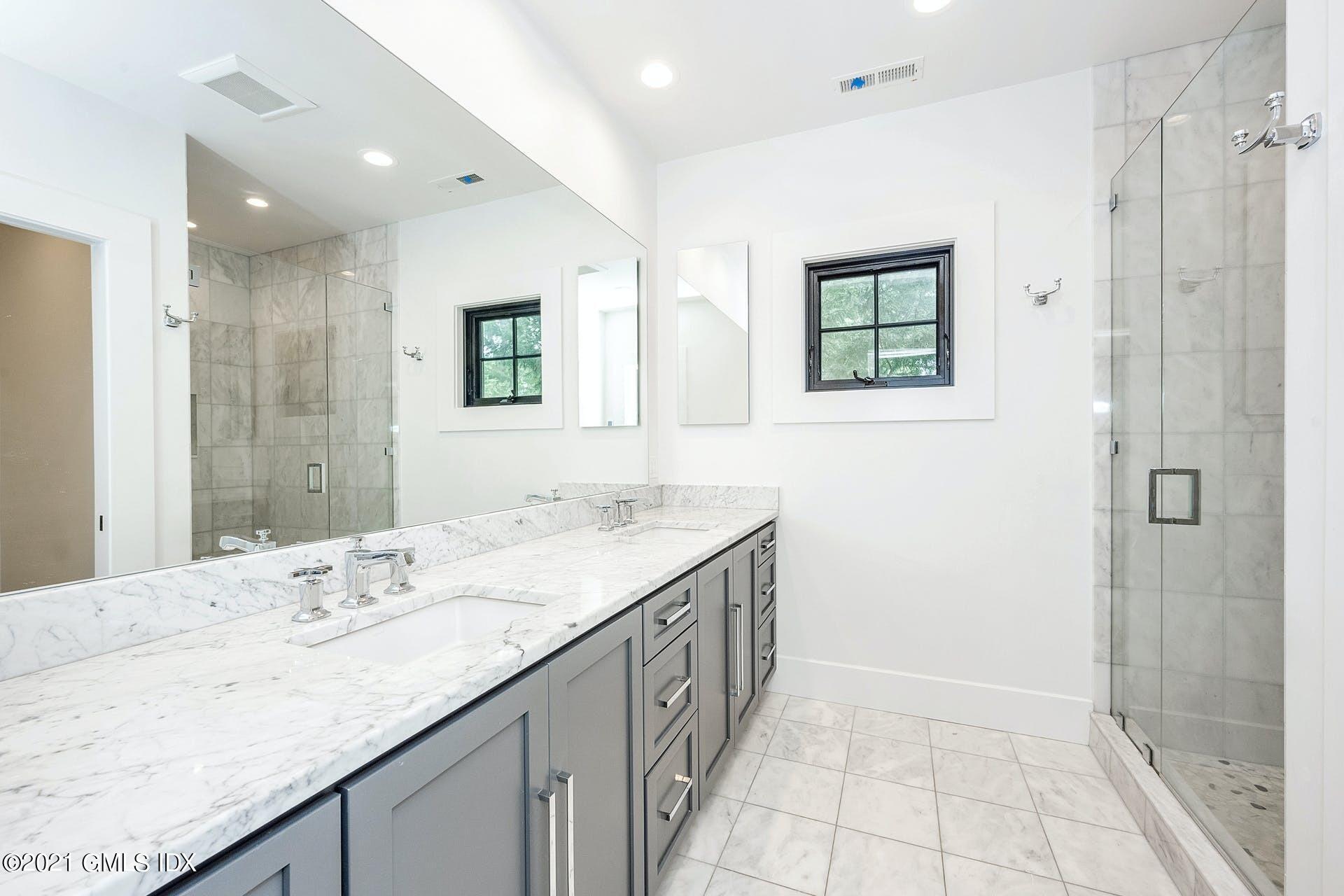 22 Wescott Street Riverside, CT 06878 - Photo 18 of 37 a bathroom with a granite countertop sink mirror and double