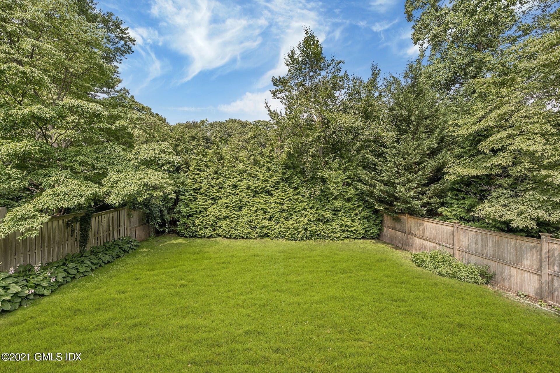 22 Wescott Street Riverside, CT 06878 - Photo 30 of 37 a view of yard with swimming pool and green space
