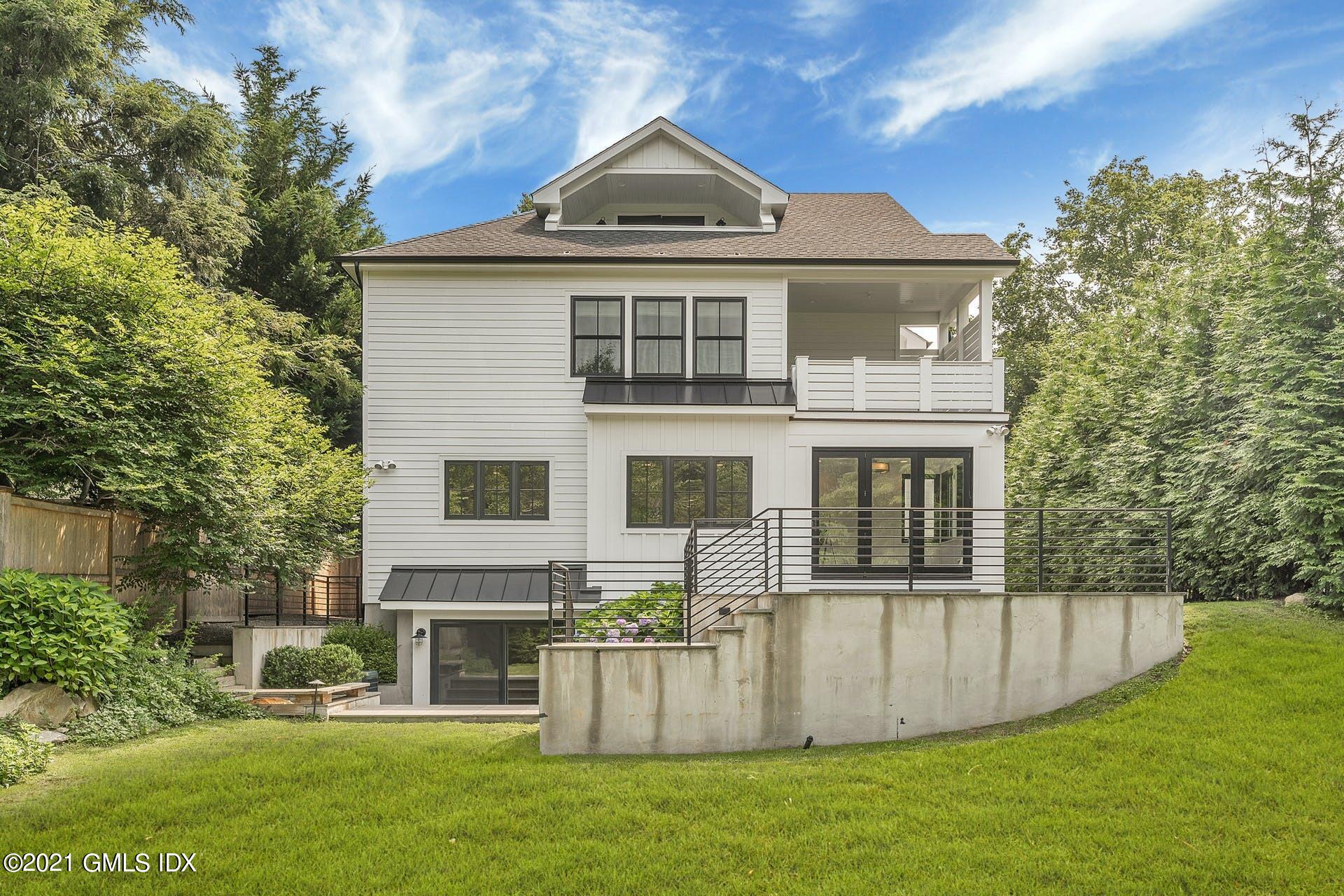 22 Wescott Street Riverside, CT 06878 - Photo 32 of 37 a front view of a house with a yard