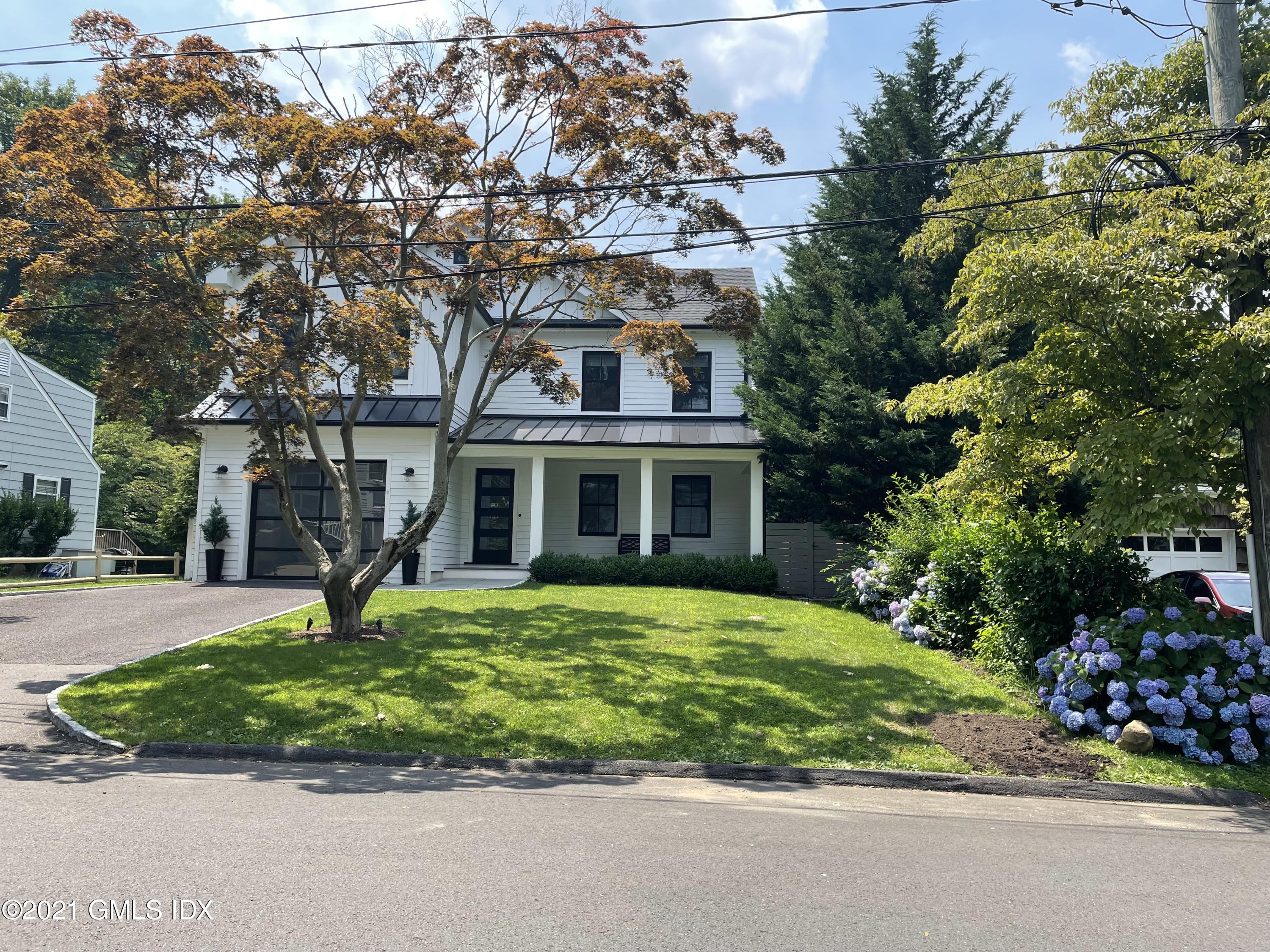 22 Wescott Street Riverside, CT 06878 - Photo 33 of 37 a view of a house with a garden