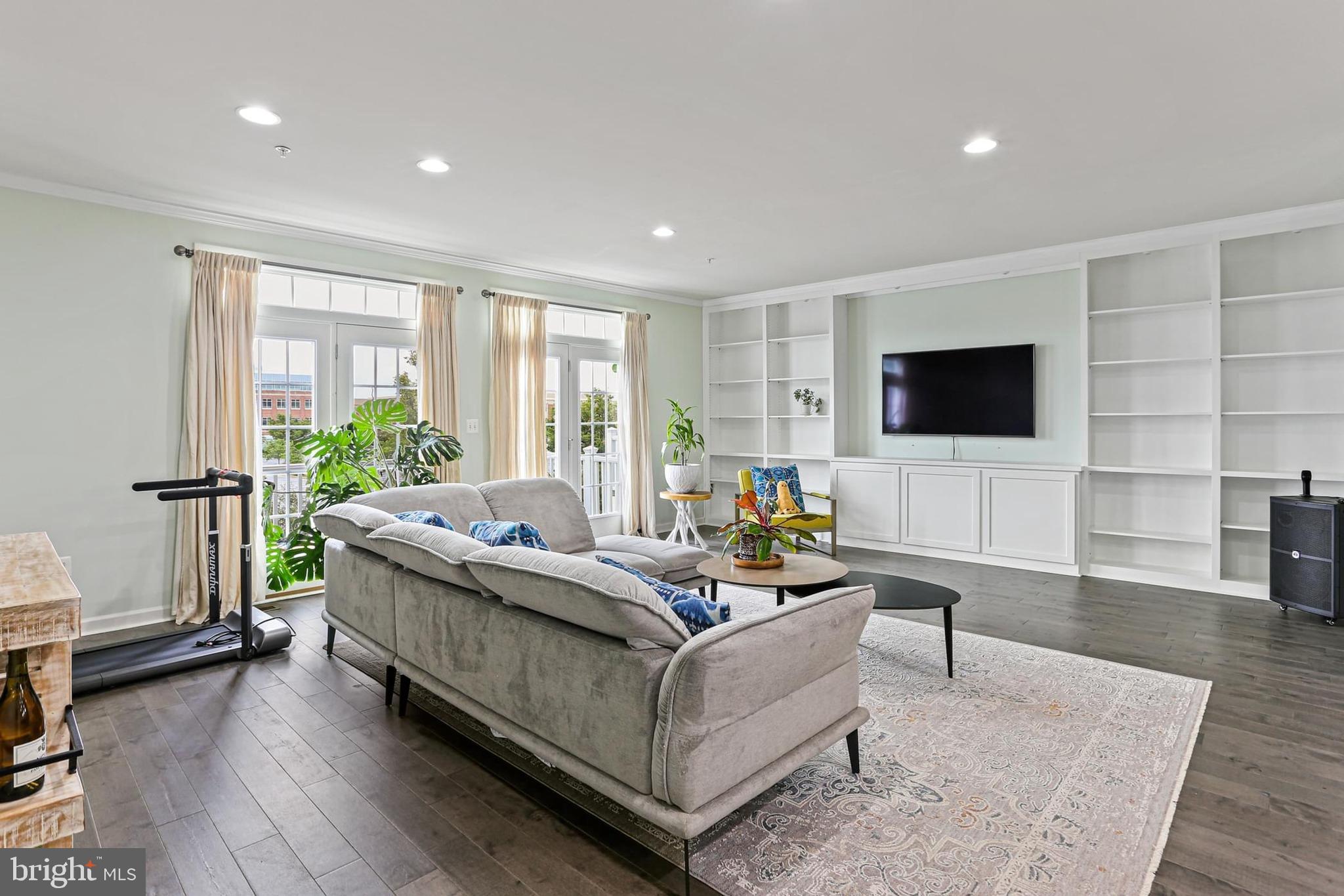 8119 Westside Boulevard Fulton, MD 20759 - Photo 3 of 32 a living room with furniture and a flat screen tv