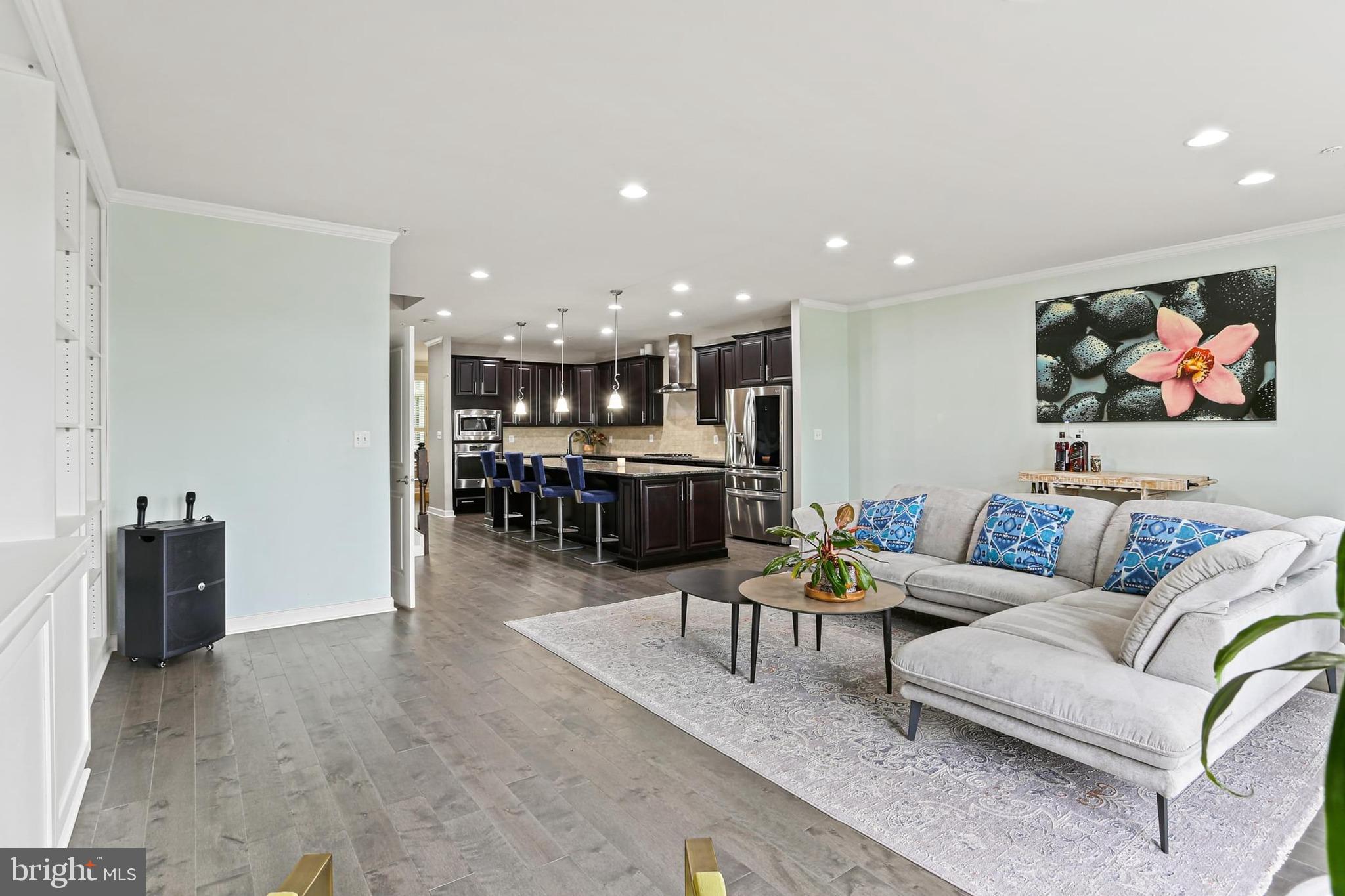 8119 Westside Boulevard Fulton, MD 20759 - Photo 6 of 32 a living room with furniture and a view of kitchen