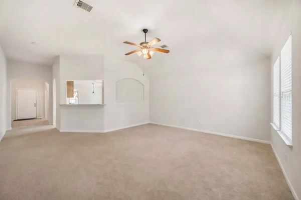 a view of empty room with a window