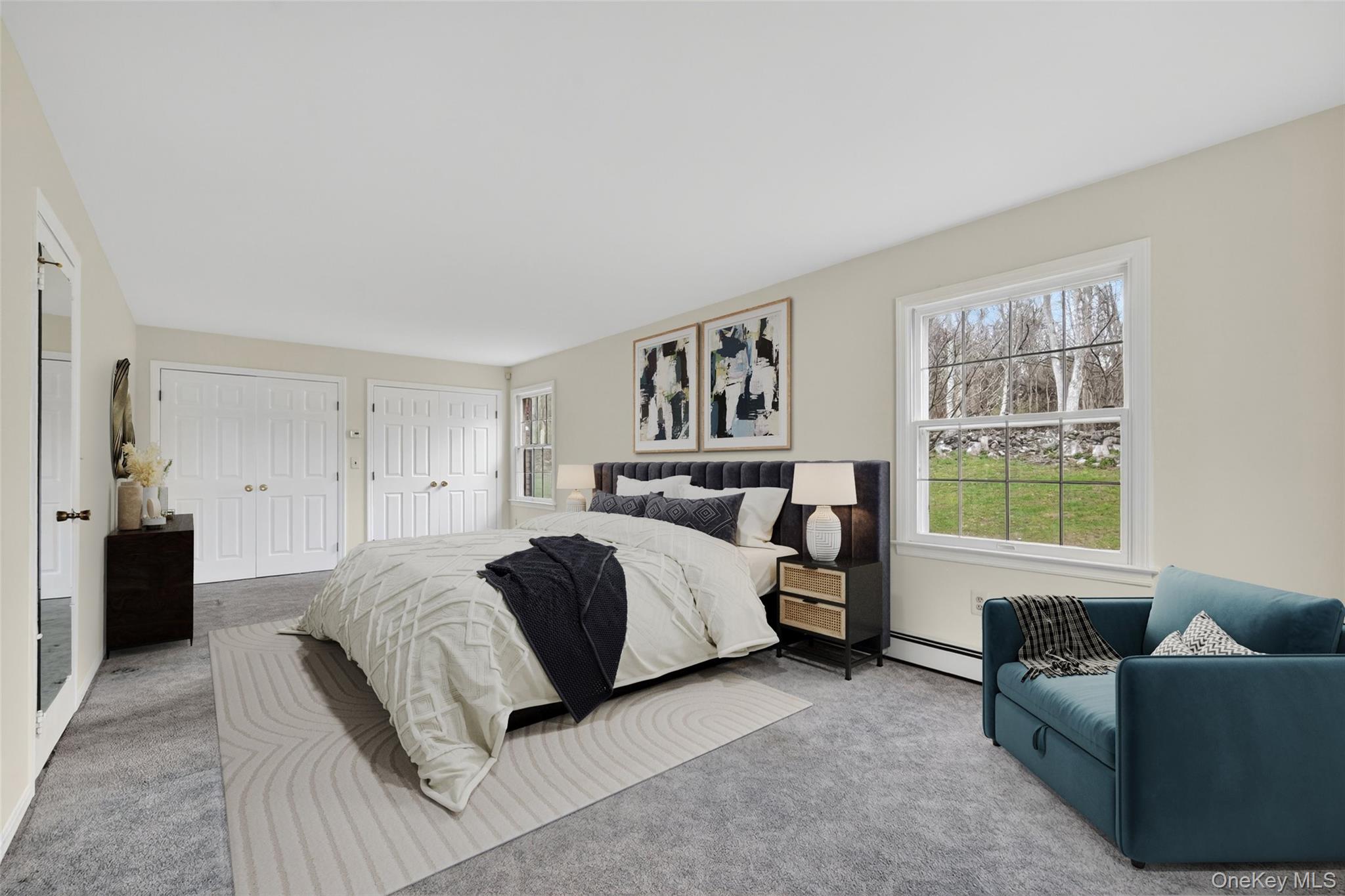 47 Still Road Westtown, NY 10998 - Photo 28 of 49 Virtually staged. - View of primary bedroom features light-colored walls and grey carpeting.