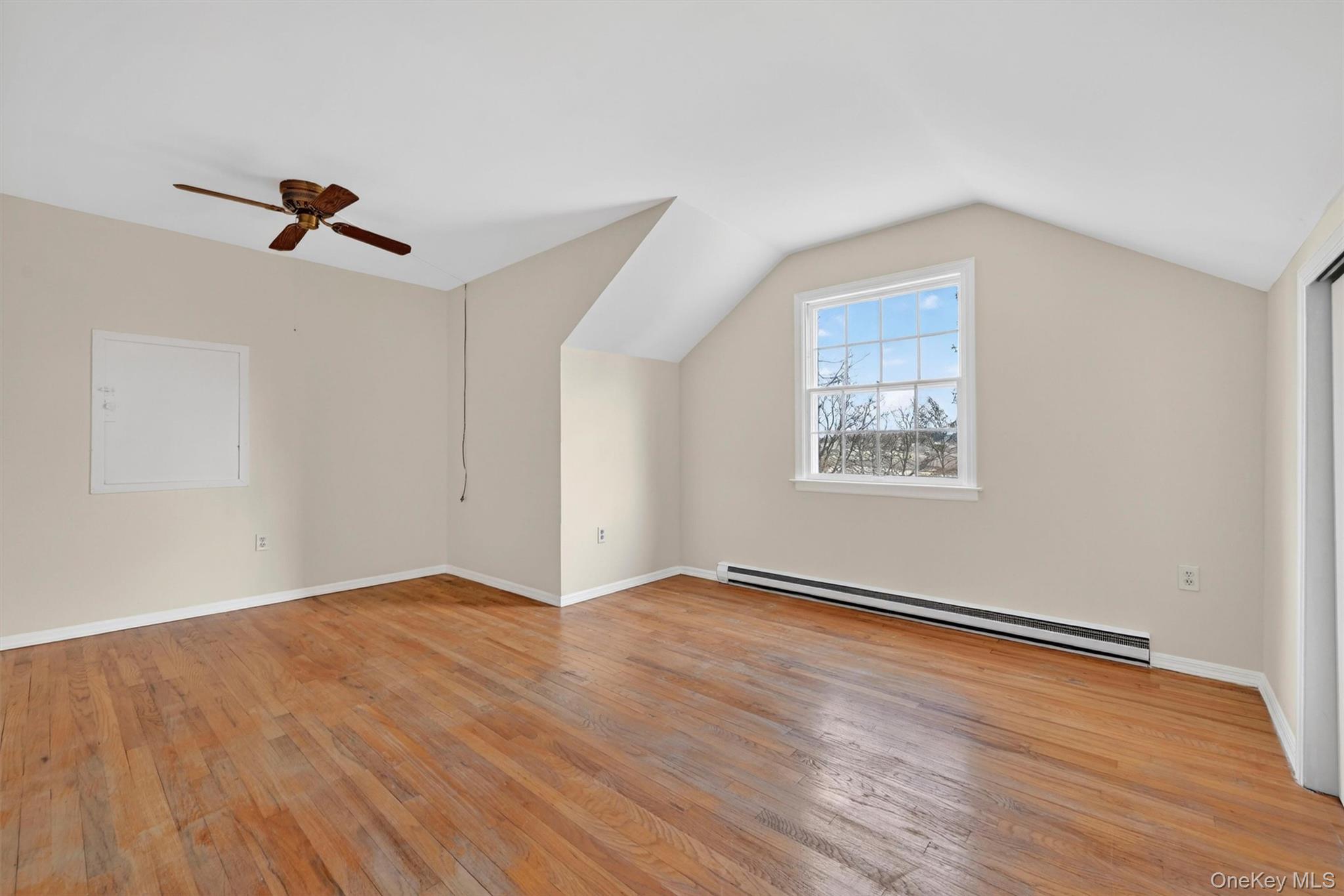 47 Still Road Westtown, NY 10998 - Photo 34 of 49 Second upstairs bedroom features hardwood flooring, a window providing natural light, and a ceiling fan
