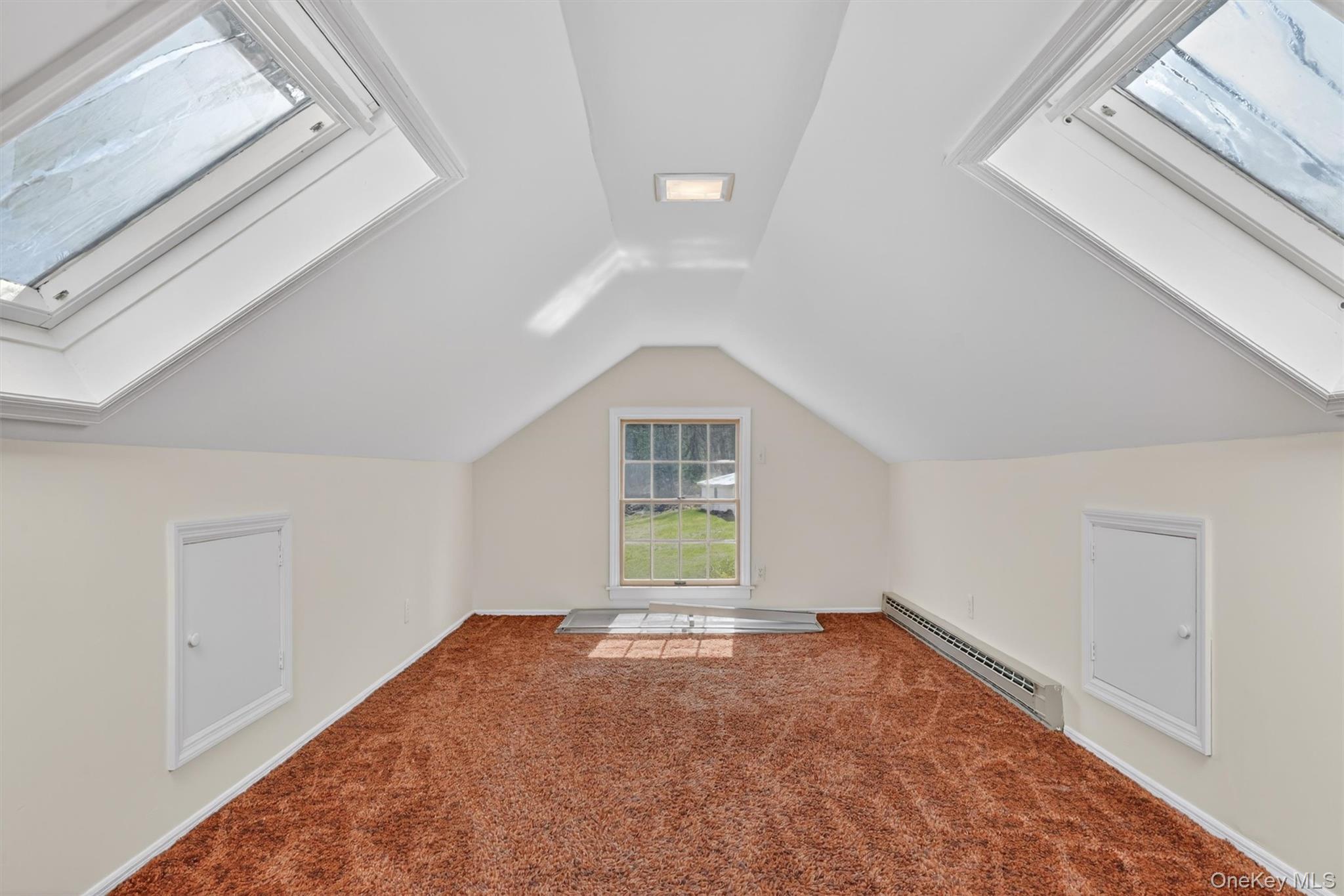 47 Still Road Westtown, NY 10998 - Photo 37 of 49 Third upstairs bedroom features a window providing views of the outdoors, two skylights creating a cozy light-filled perch.