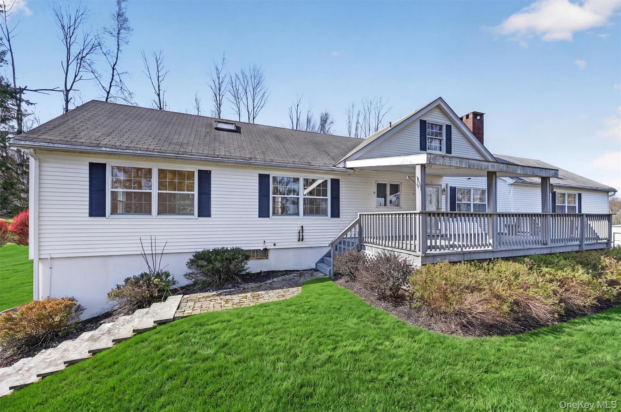 47 Still Road Westtown, NY 10998 - Photo 40 of 49 View of the back of the property with deck and walkway to back and side yards.
