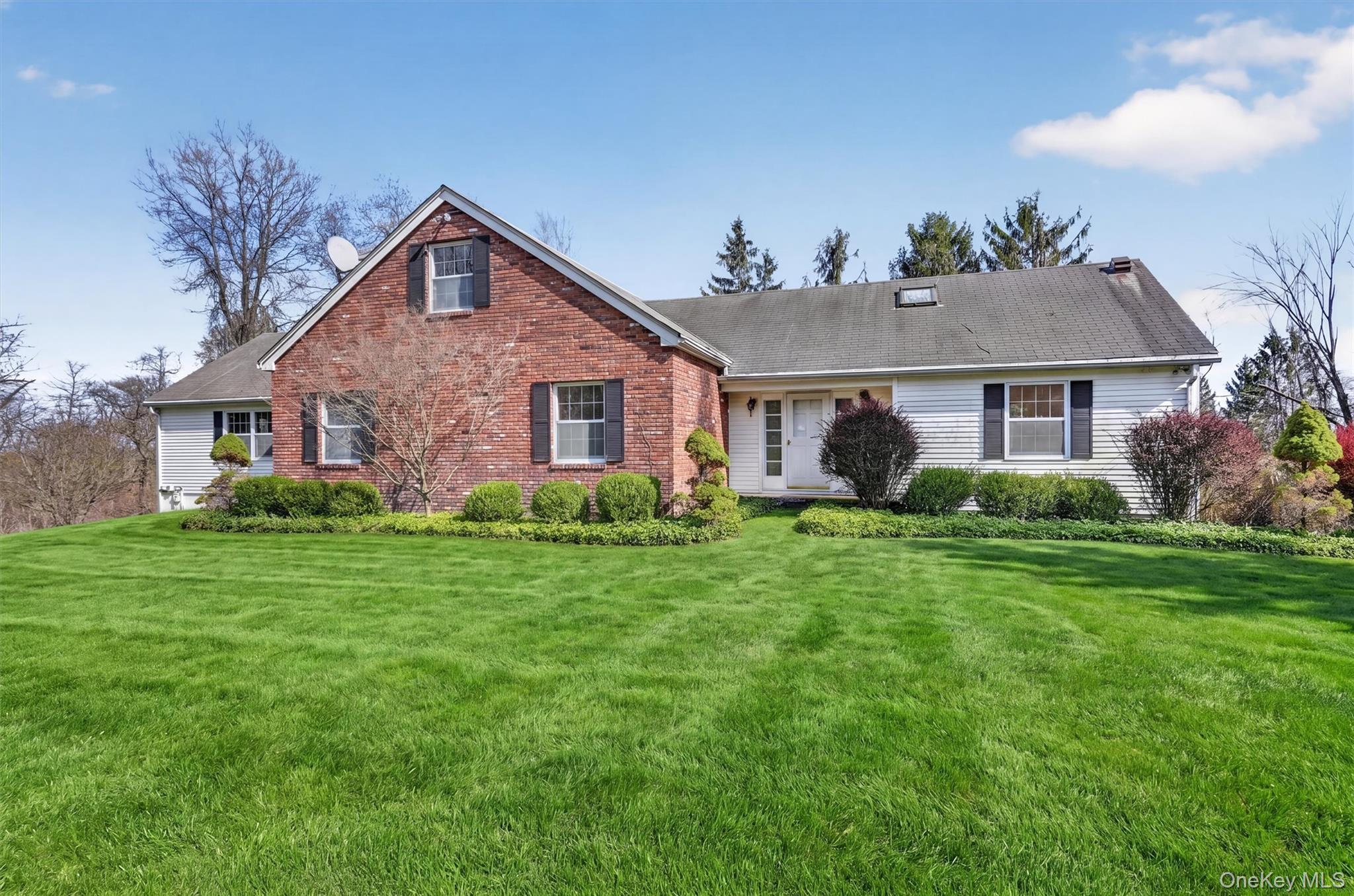 47 Still Road Westtown, NY 10998 - Photo 6 of 49 View of the front of the property with brick and vinyl siding.