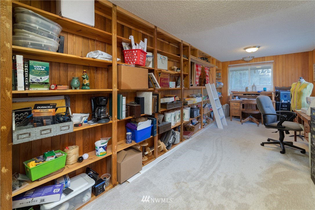 12020 Moen Road Granite Falls, WA 98252 - Photo 12 of 27 a store room with lots of different colored cloths