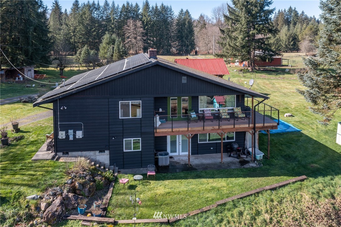 12020 Moen Road Granite Falls, WA 98252 - Photo 2 of 27 a view of house with a yard