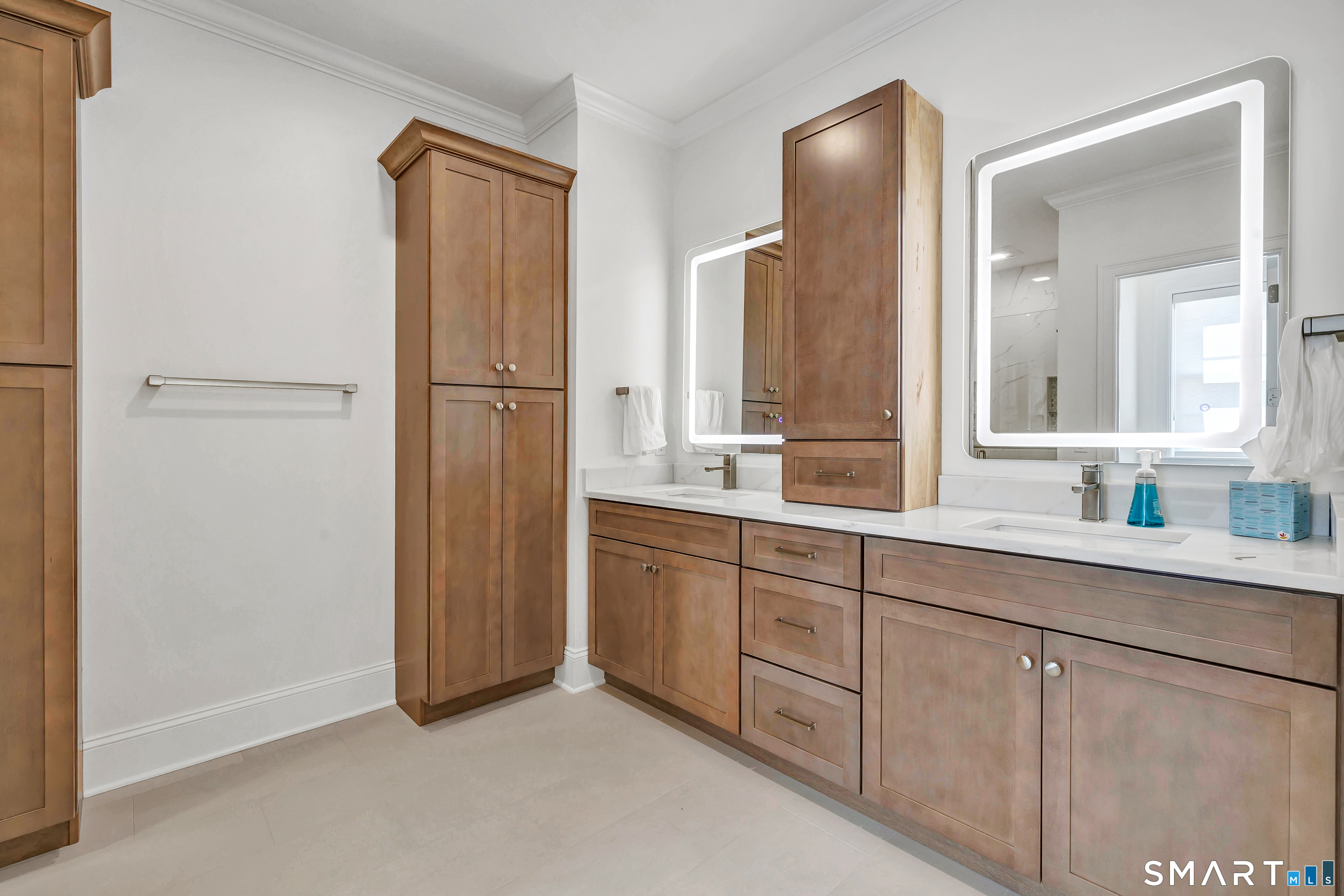 19 Winthrop Woods Road Shelton, CT 06484 - Photo 4 of 9 a bathroom with a double vanity sink and mirror