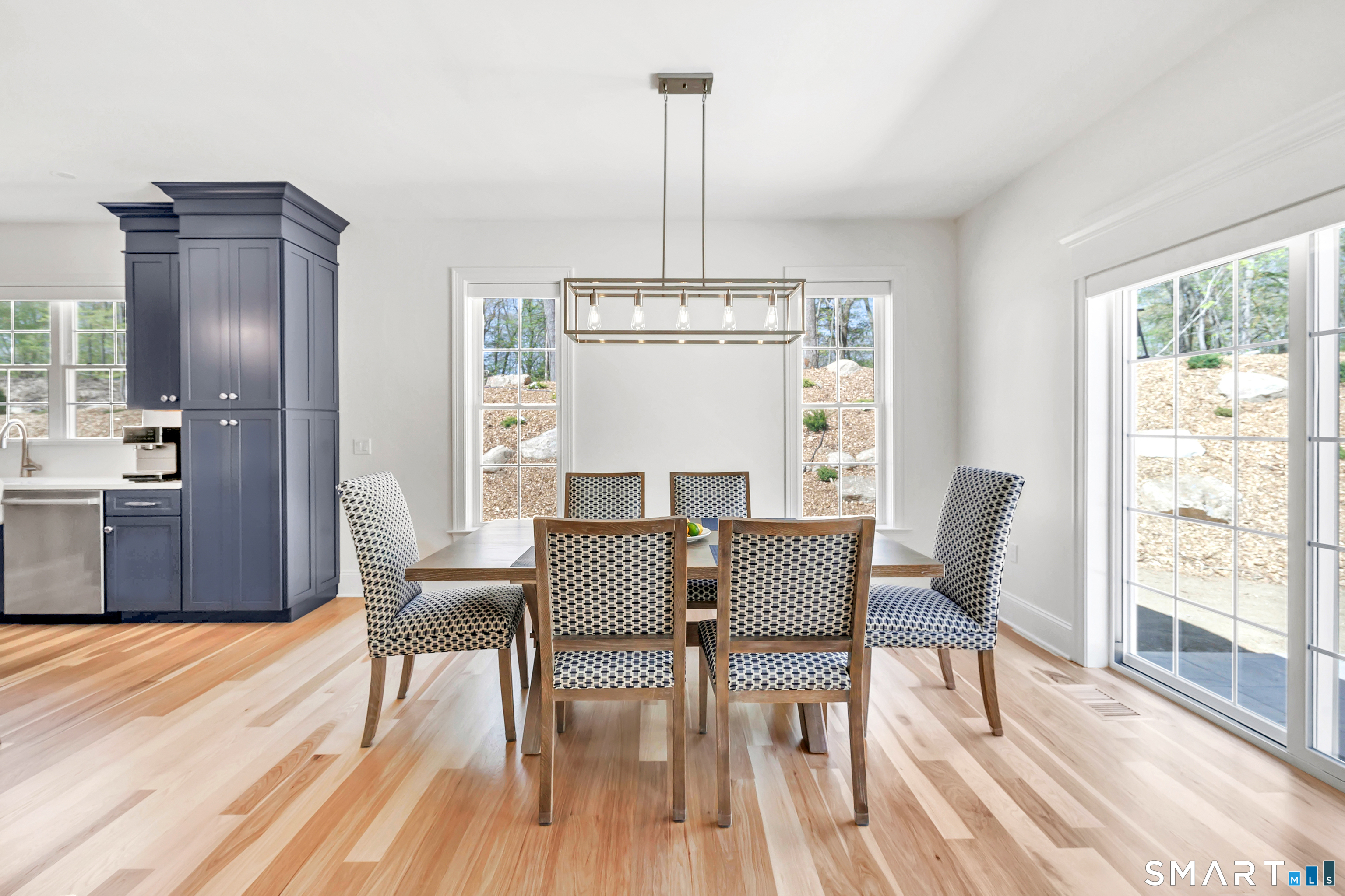 19 Winthrop Woods Road Shelton, CT 06484 - Photo 6 of 9 a view of a dining room with furniture window and wooden floor