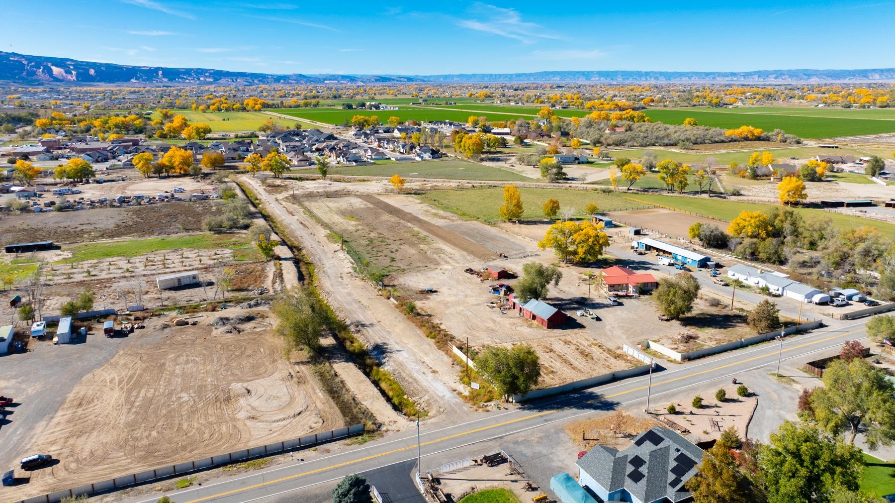 811 24 Road Grand Junction, CO 81505 - Photo 6 of 17 an aerial view of residential houses with outdoor space