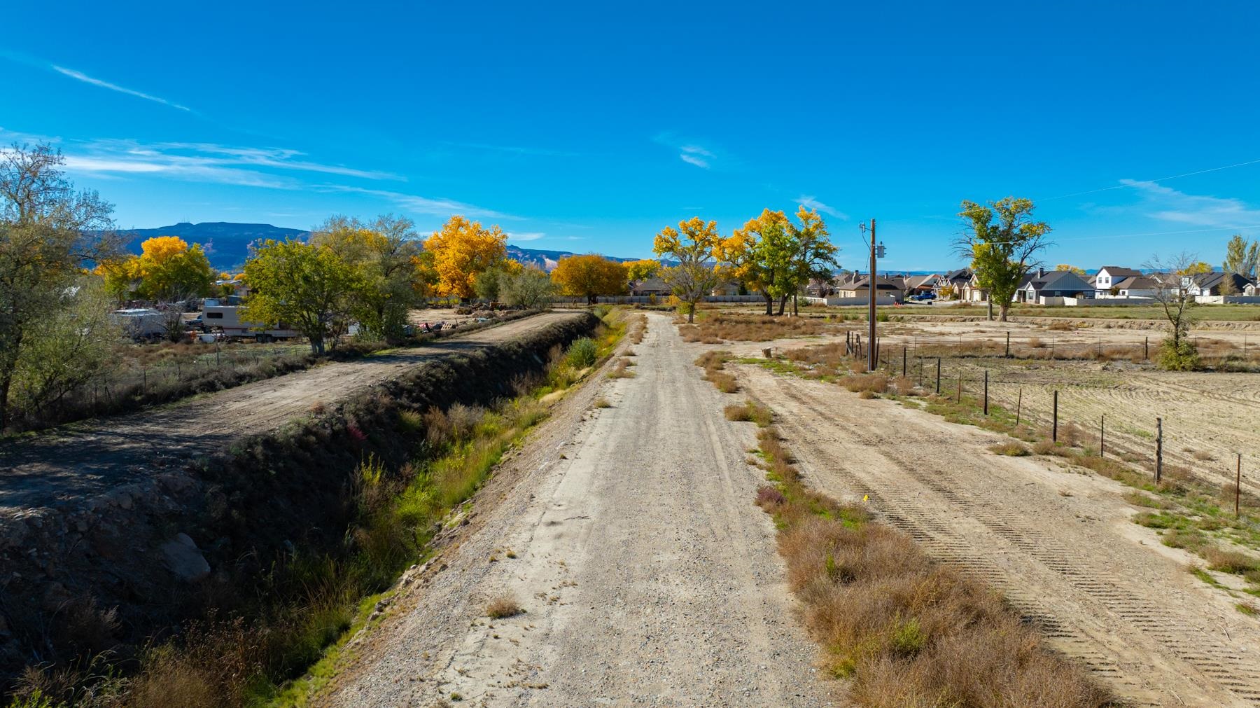 811 24 Road Grand Junction, CO 81505 - Photo 7 of 17 a view of a lake with a houses