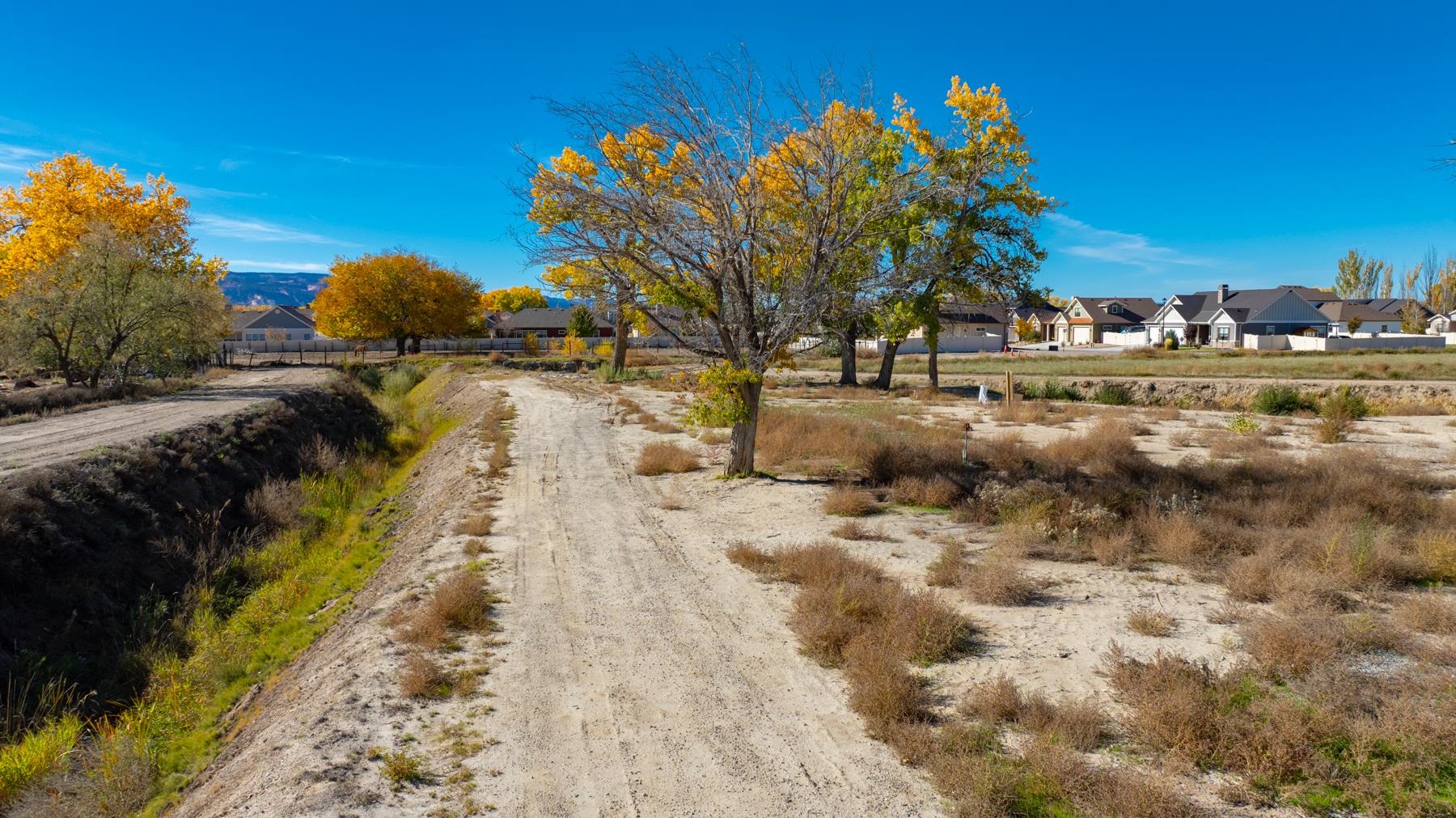 811 24 Road Grand Junction, CO 81505 - Photo 8 of 17 a view of a lake with houses