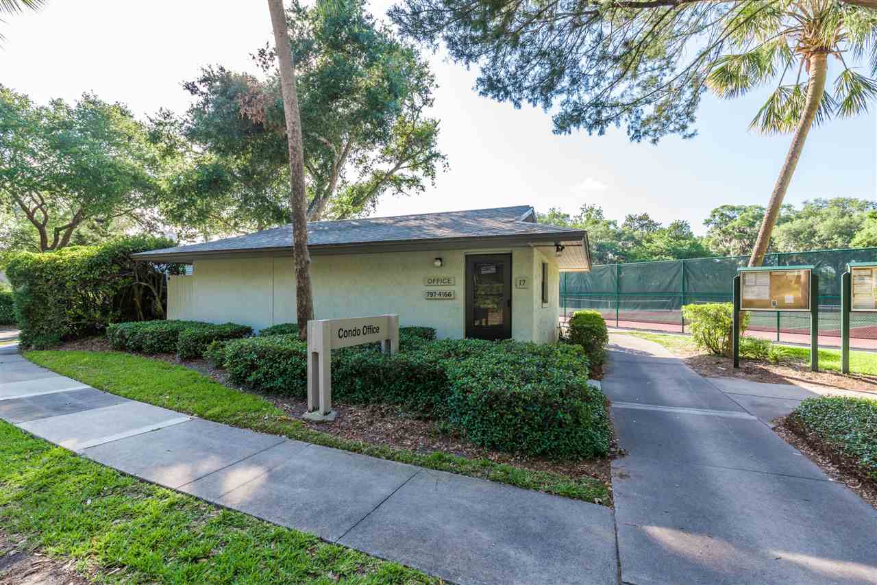 15 Catalonia Court St. Augustine, FL 32086 - Photo 22 of 27 a view of a backyard with plants and a barbeque
