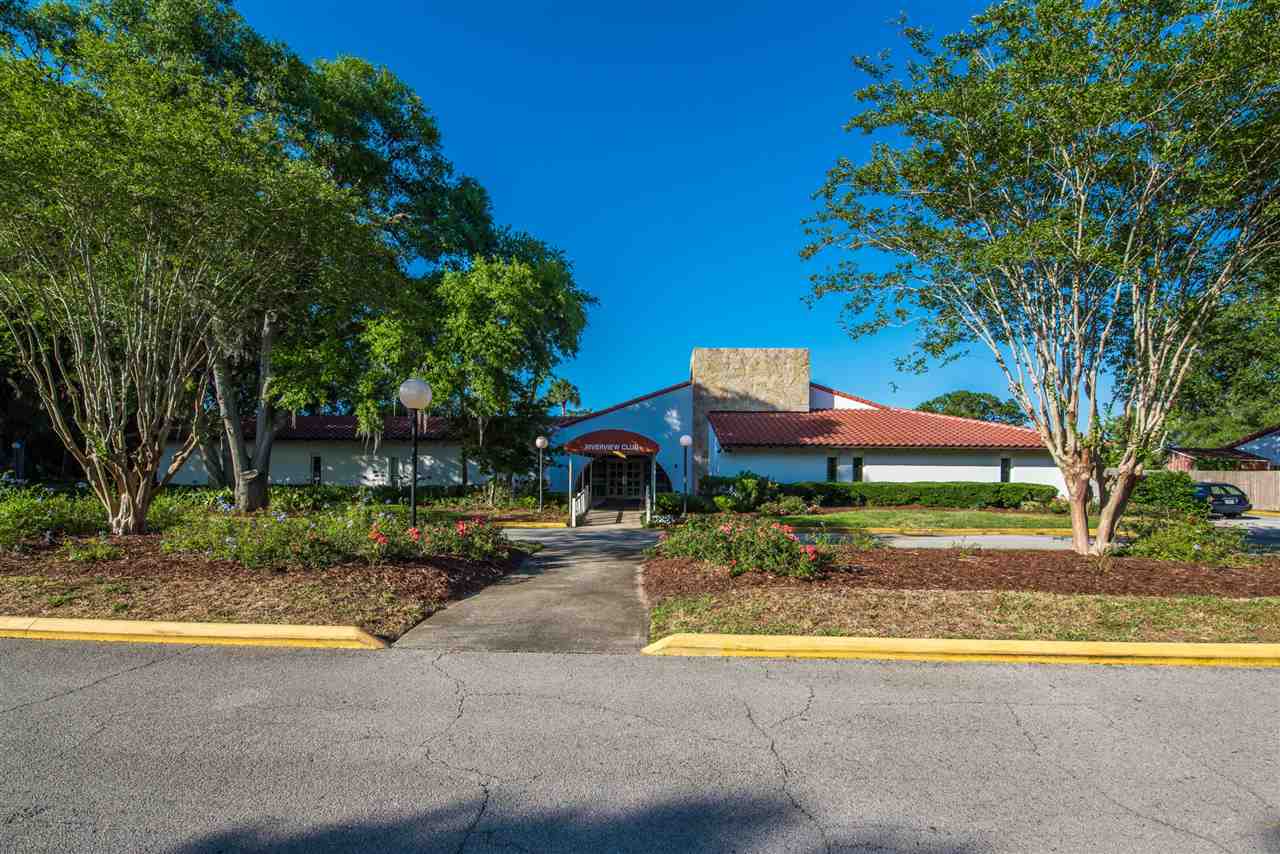 15 Catalonia Court St. Augustine, FL 32086 - Photo 25 of 27 a view of a house with a yard and sitting area