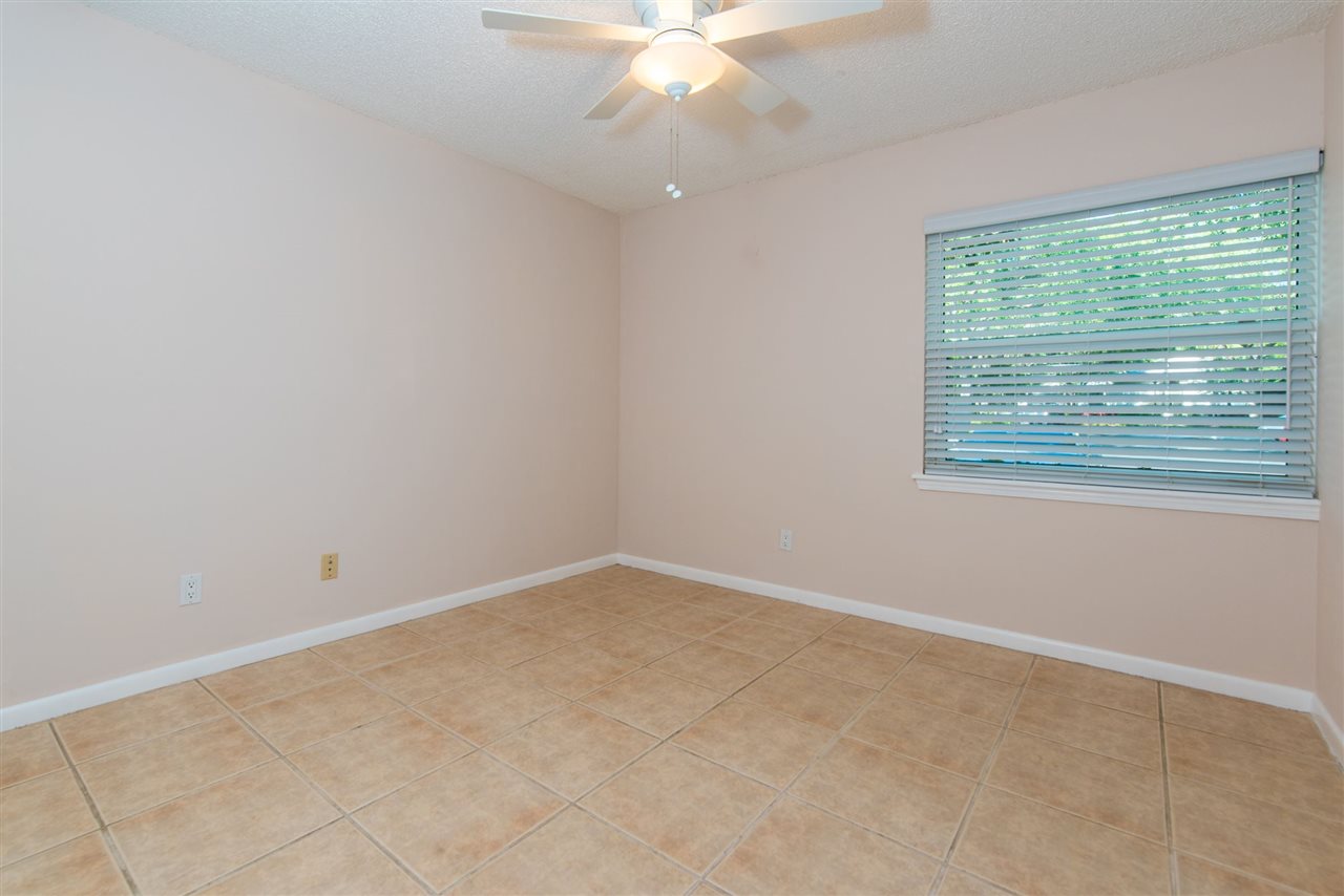 15 Catalonia Court St. Augustine, FL 32086 - Photo 9 of 27 an empty room with a window