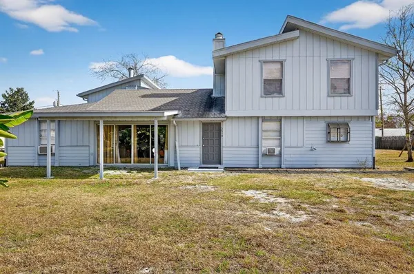 a house with yard in front of it