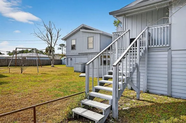a view of a house with a swimming pool