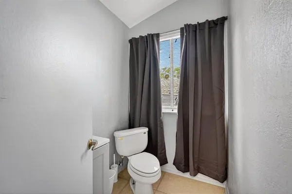 a bedroom with a bed and furniture