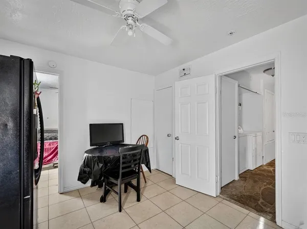 a bedroom with a bed and a cabinets