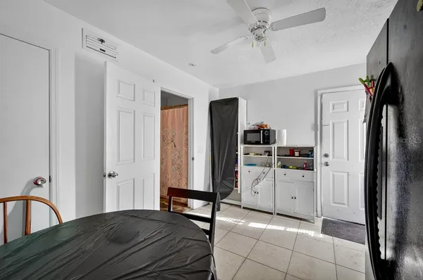 a bedroom with a bed and a walk in closet