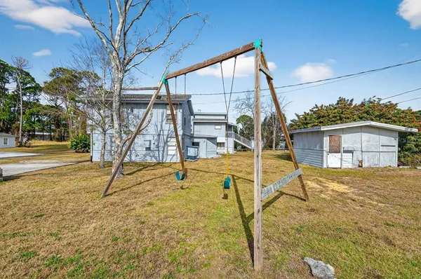 a house view with a swimming pool