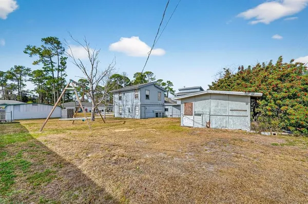 a house view with a outdoor space