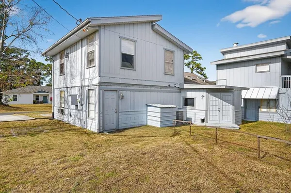 a house view with a outdoor space