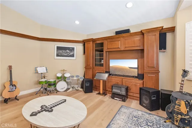 a bed room with a bed and a chair