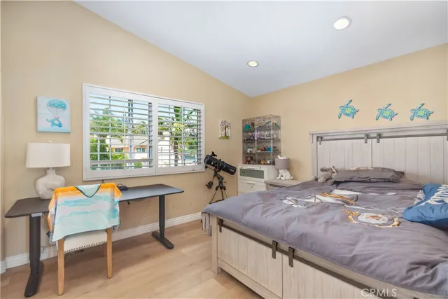 a bathroom with a double vanity sink mirror and shower