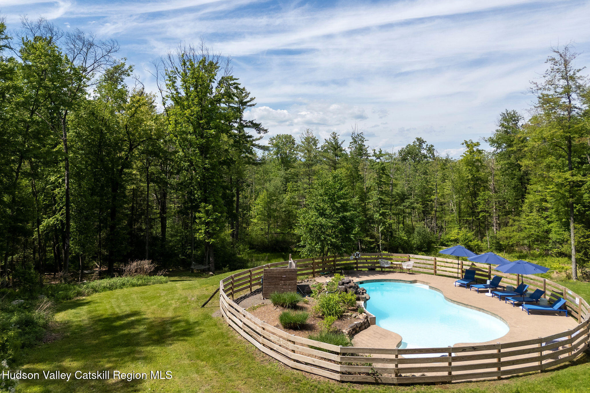 31 Laurel Hollow Road Kerhonkson, NY 12446 - Photo 36 of 47 a view of a swimming pool with a yard and seating space