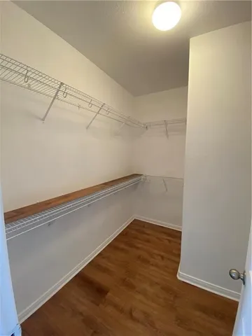 a view of a room with racks on the wall