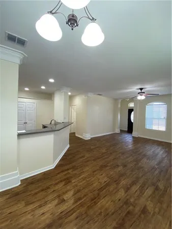 a view of a kitchen and a sink