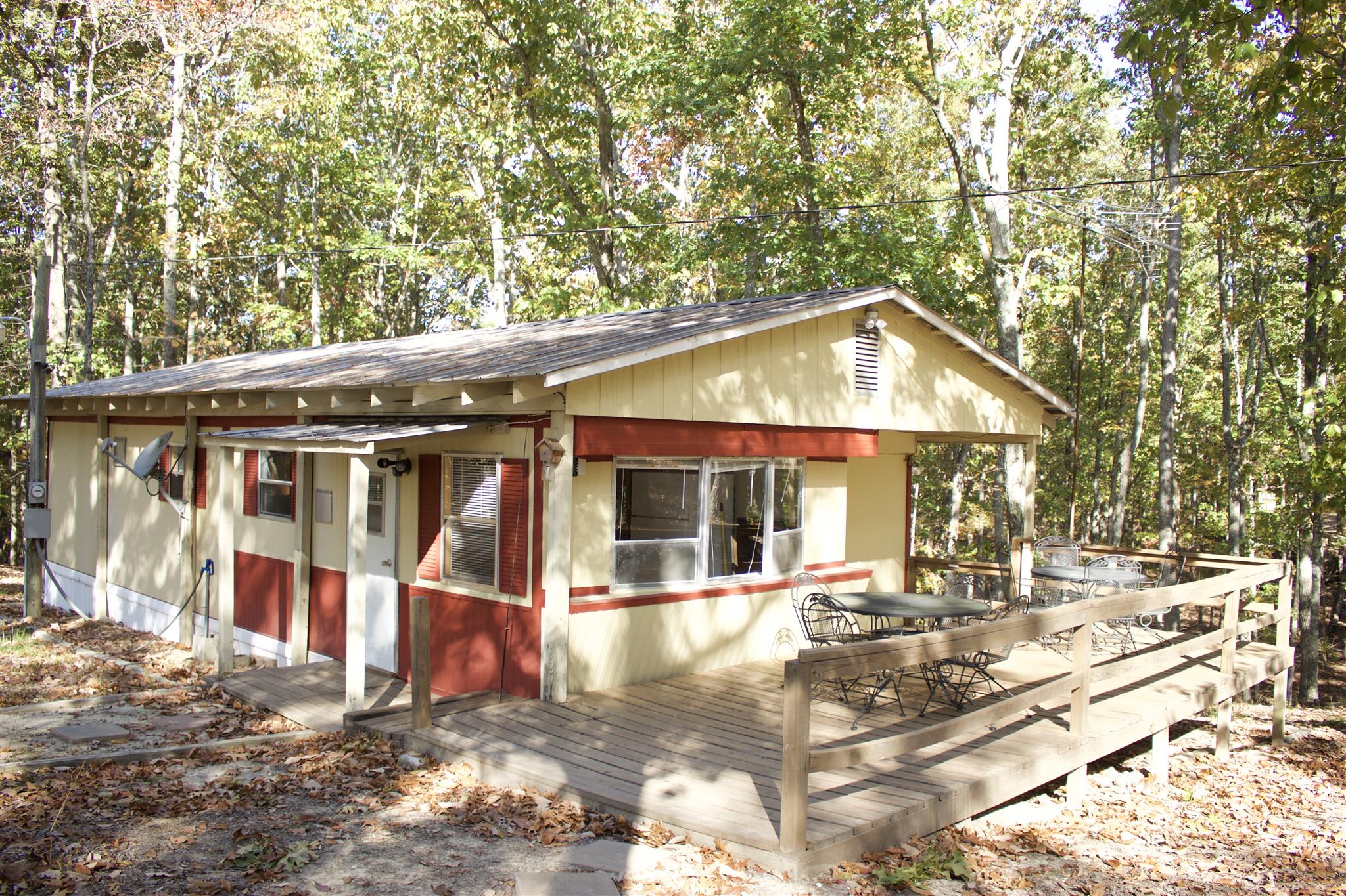 558 Ridgeway Drive Sugar Tree, TN 38380 - Photo 2 of 30 558 Ridgeway Drive. 2+ bedroom on large wooded private lot. Features new central HVAC and new plumbing, upgraded electric, metal roof, oversized garage.