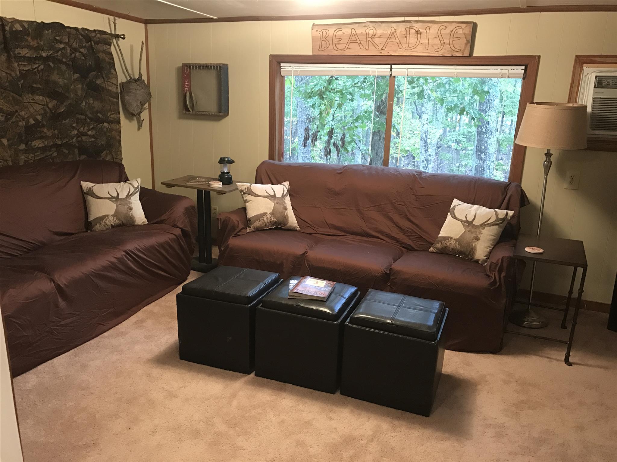 558 Ridgeway Drive Sugar Tree, TN 38380 - Photo 11 of 30 Cozy living room overlooks wooded yard.