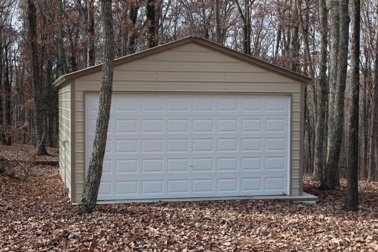 558 Ridgeway Drive Sugar Tree, TN 38380 - Photo 26 of 30 Lots of storage for your boat and ATV's in this 18 x 26 ft oversized garage.