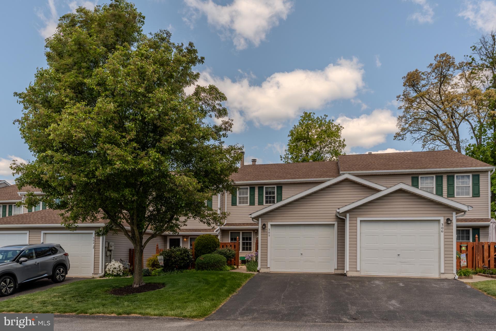 305 Stonegate Road York, PA 17408 - Photo 1 of 38 Charming duplex with lush greenery.