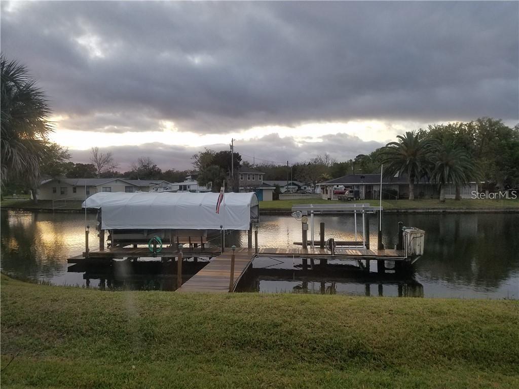 10906 West Cove Harbor Drive, Unit 10906 Crystal River, FL 34428 - Photo 2 of 15 a view of a lake