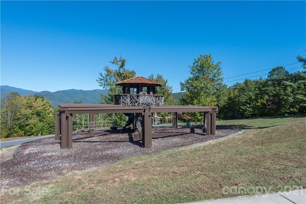 11 Old Greybeard Loop, Unit 3A1 Black Mountain, NC 28711 - Photo 14 of 15 a view of a patio with a table and chairs