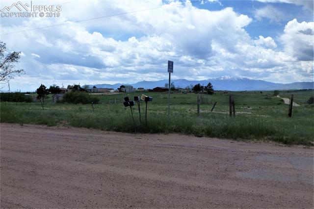 3460 Meridian Road Peyton, CO 80831 - Photo 7 of 7 East fence line facing Meridian Road. Paved to this corner of Meridian Rd and S Blaney Rd