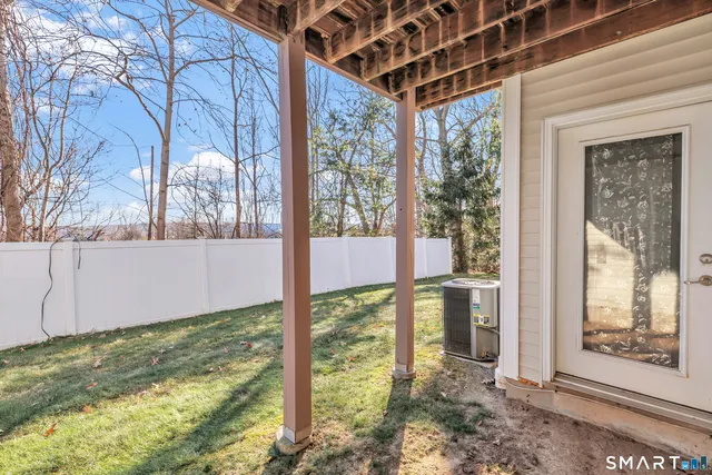 a view of a backyard of the house
