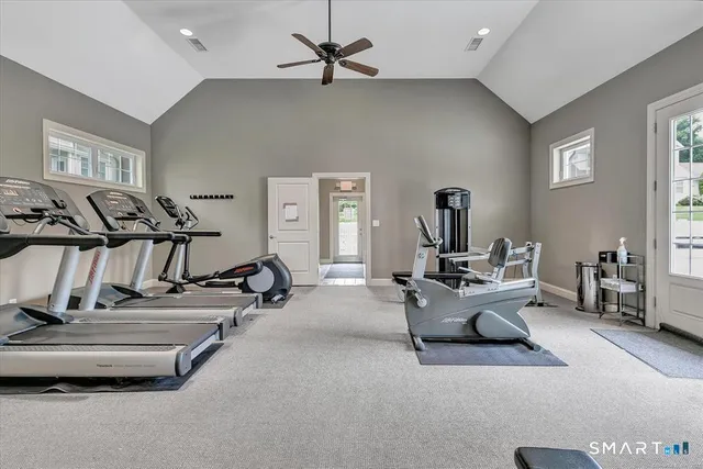 a view of a livingroom with furniture and a flat screen tv