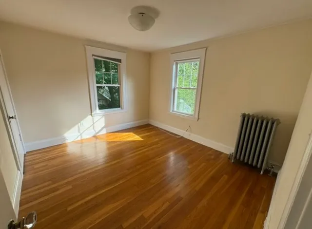 a bathroom with a bathtub a toilet and a shower